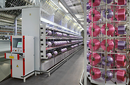 Part of Oerlikon Barmag's efficient solution for the production of excellent quality high-titer yarns: the eAFK Big V multi-spindle texturing machine. Part of Oerlikon Barmag's efficient solution for the production of excellent quality high-titer yarns: the eAFK Big V multi-spindle texturing machine.