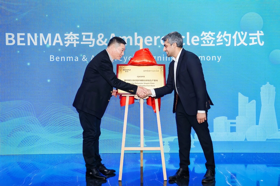 Benma and Ambercycle at Signing Ceremony (From left to right: Xu Guoliang – Chairman, Benma; Shay Sethi – CEO, Ambercycle). Ambercycle and Benma have partnered to scale the production of cycora® staple fibers by leveraging their combined expertise and Benma’s direct investment in Ambercycle’s technology scale-up © 2025 Ambercycle Benma and Ambercycle at Signing Ceremony (From left to right: Xu Guoliang – Chairman, Benma; Shay Sethi – CEO, Ambercycle). Ambercycle and Benma have partnered to scale the production of cycora® staple fibers by leveraging their combined expertise and Benma’s direct investment in Ambercycle’s technology scale-up © 2025 Ambercycle