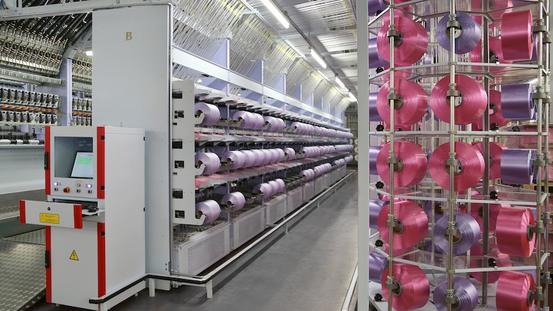 The eAFK Big V multi-spindle texturing machine is part of the solution of the Barmag product brand Oerlikon Barmag for the production of high-quality, high-titer yarns © 2025 Barmag The eAFK Big V multi-spindle texturing machine is part of the solution of the Barmag product brand Oerlikon Barmag for the production of high-quality, high-titer yarns © 2025 Barmag