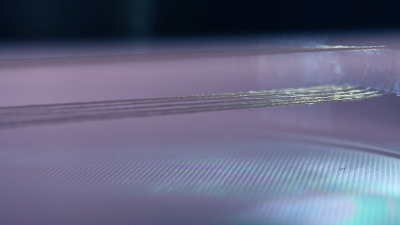 Plasma cloud: The plasma system atomizes environmentally friendly siloxanes into a cloud that can coat textile fibers with nanometer precision. Image: Empa Plasma cloud: The plasma system atomizes environmentally friendly siloxanes into a cloud that can coat textile fibers with nanometer precision. Image: Empa