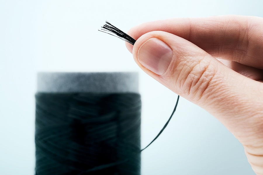 Ultra-thin and high-performance: The bio-based carbon fibers developed at the Fraunhofer IAP can reach diameters well below four micrometers. Their mechanical, electrical and thermal performance matches that of conventional petroleum-based carbon fibers. © 2025 Fraunhofer IAP / Kristin Stein Ultra-thin and high-performance: The bio-based carbon fibers developed at the Fraunhofer IAP can reach diameters well below four micrometers. Their mechanical, electrical and thermal performance matches that of conventional petroleum-based carbon fibers. © 2025 Fraunhofer IAP / Kristin Stein