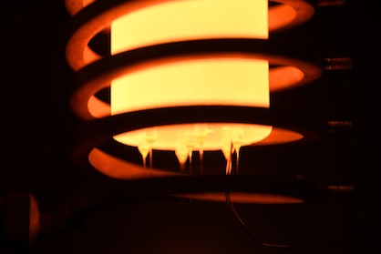 1. Bushing heated via induction of the novel glass fibre production line (c) 2019 ITA 1. Bushing heated via induction of the novel glass fibre production line (c) 2019 ITA