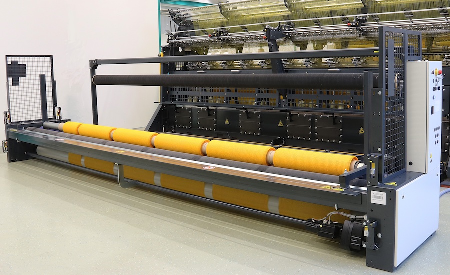 The new fabric dosing device on the KARL MAYER raschel machines offers more convenience and reliability in net production © 2025 KARL MAYER The new fabric dosing device on the KARL MAYER raschel machines offers more convenience and reliability in net production © 2025 KARL MAYER