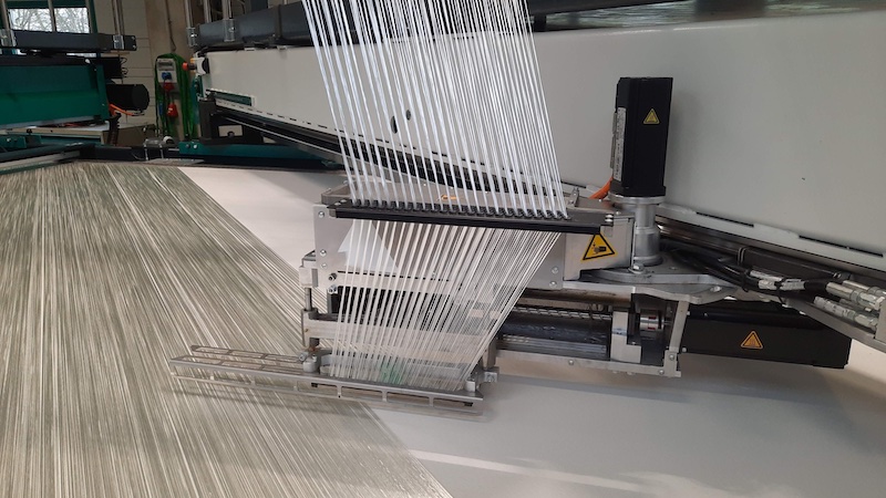 The weft layer as a detail of the KARL MAYER MAX GLASS ECO © 2024 KARL MAYER The weft layer as a detail of the KARL MAYER MAX GLASS ECO © 2024 KARL MAYER