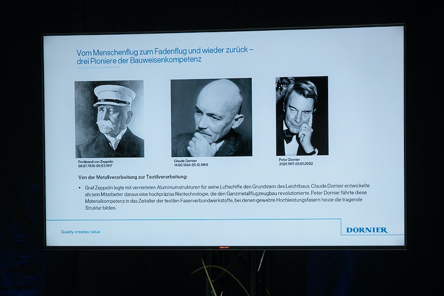 “Pioneers of structural engineering expertise”: Drawing on the examples of Count Zeppelin, Claude Dornier and Peter Dornier, Peter D. Dornier traced the evolution of lightweight construction in aviation, from riveting technology for aluminum to gripper weaving machine technology for sensitive glass and carbon fibers © 2026 Lindauer DORNIER