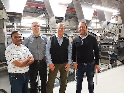 The new POY spinning machine with (from left to right) Sandeep Onkar (IVL), Christian Schneider, Thomas Rademacher, Andre Altmann (all Trevira GmbH) (c) 2019 Trevira