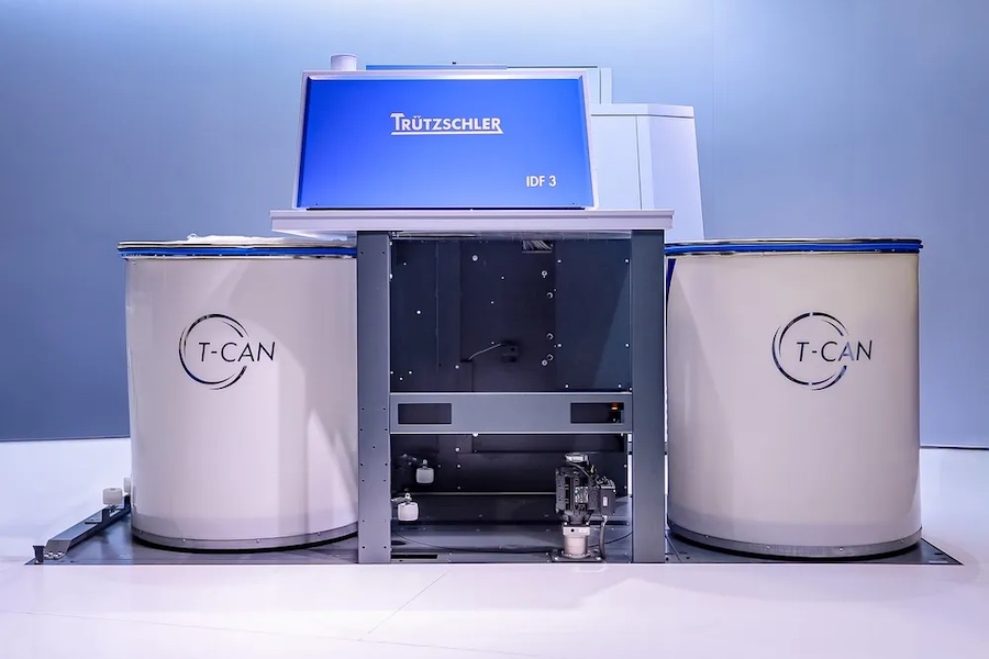T-CAN is Trützschler’s automation solution designed to transform can transport in spinning preparation. © 2026 Trützschler 