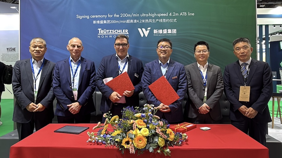 Representatives of Trützschler and Wisdom Group at the signing ceremony (from left to right) <br />
Mr. WeiZhong Zhu (Sales Director of Trützschler Textile Machinery (Jiaxing) Co., Ltd.), Mr. Harald Schoepp(General Manager of Trützschler China), Mr. Matthias Schemken (Managing Director of Trützschler Nonwovens), Mr. Guang Yang (General Manager of Wisdom Group), Mr. Weiping Zhang (Vice General Manager of Trützschler Textile Machinery (Jiaxing) Co., Ltd.) Mr. Qingchun Lu (Director of Research and Development of Wisdom Group)<br />
 © 2026 Trützschler