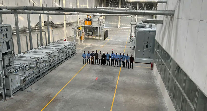 (c) 2025 ANDRITZ GROUP - Pacific Jeans and ANDRITZ teams with the newly installed tearing line (c) 2025 ANDRITZ GROUP - Pacific Jeans and ANDRITZ teams with the newly installed tearing line