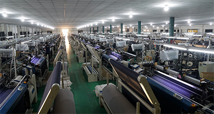 Weaving machine at Vietnam-based Tuong Long, the first denim manufacturer in Vietnam to switch 100% of its production to Archroma’s aniline-free* Denisol® Pure Indigo.
(Photo: Tuong Long) Weaving machine at Vietnam-based Tuong Long, the first denim manufacturer in Vietnam to switch 100% of its production to Archroma’s aniline-free* Denisol® Pure Indigo.
(Photo: Tuong Long)