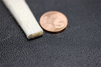 3D-Printed continuous fiber reinforced test coupon. Photo: DITF 3D-Printed continuous fiber reinforced test coupon. Photo: DITF