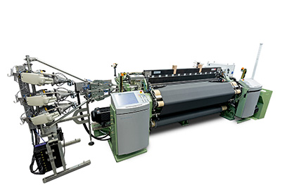 Weaving for the automotive industry: In Asia too, tirecord, upholstery and airbags are manufactured on air-jet weaving machines from DORNIER
(Photo: “DORNIER A1”; Source: DORNIER) Weaving for the automotive industry: In Asia too, tirecord, upholstery and airbags are manufactured on air-jet weaving machines from DORNIER
(Photo: “DORNIER A1”; Source: DORNIER)