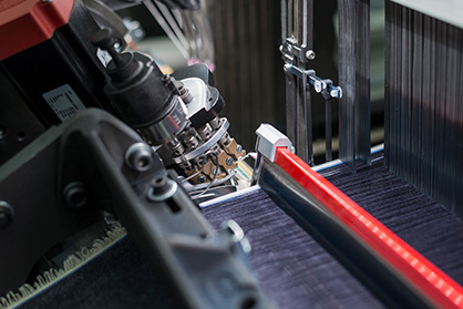 iSAVER has been introduced at ITM 2018. It is a unique and revolutionary device that eliminates the waste selvedge on the left-hand side of the fabric (c) 2019 itema iSAVER has been introduced at ITM 2018. It is a unique and revolutionary device that eliminates the waste selvedge on the left-hand side of the fabric (c) 2019 itema