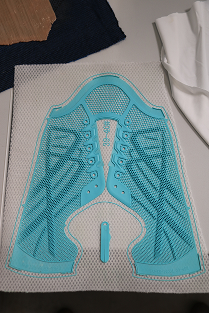 Warp-knitted footwear fabric with 3D-printed reinforcement structure © 2022 KARL MAYER Warp-knitted footwear fabric with 3D-printed reinforcement structure © 2022 KARL MAYER