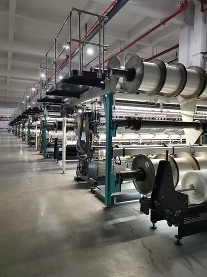 SinceTech's warp knitting mill with KARL MAYER's RD 7/2-6 EN double needle bar raschel machines © 2022 KARL MAYER