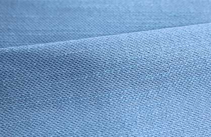 Trendy fabric from a WEFT.FASHION TM 3 in a yarn-dyed, coarse natural fibre flame yarn © 2021 KARL MAYER Trendy fabric from a WEFT.FASHION TM 3 in a yarn-dyed, coarse natural fibre flame yarn © 2021 KARL MAYER