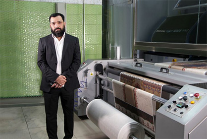 Muhammad Asif, CEO at Moti Fabrics, standing in front of one of the company’s two Tiger-1800B MkII direct-to-textile printers © 2020 Mimaki Muhammad Asif, CEO at Moti Fabrics, standing in front of one of the company’s two Tiger-1800B MkII direct-to-textile printers © 2020 Mimaki