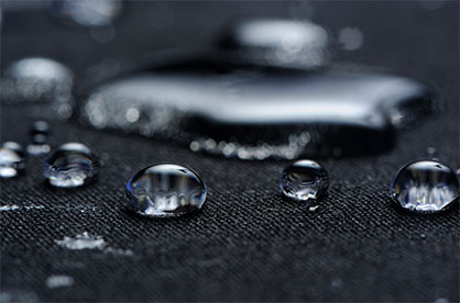 The textile industry was challenged to develop a material that would repel rain, but at the same time be breathable for the wearer. © Shutterstock The textile industry was challenged to develop a material that would repel rain, but at the same time be breathable for the wearer. © Shutterstock