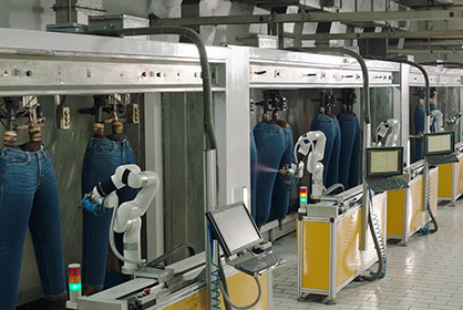 Proprietary robotics for garment finishing at AGI Denim. © 2021 Monforts