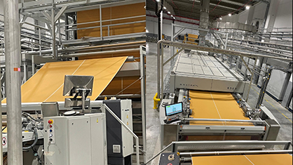 The specially-configured Montex line at the Hordain plant is equipped with special entrance and exit fabric accumulators to enable non-stop processing during batch changes. © 2022 Monforts The specially-configured Montex line at the Hordain plant is equipped with special entrance and exit fabric accumulators to enable non-stop processing during batch changes. © 2022 Monforts