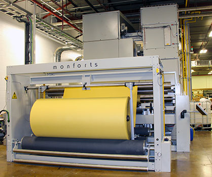 Finished roll coming off the line at Albarrie. © 2022 Monforts