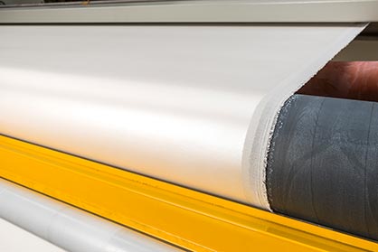 A Monforts texCoat magnetic coating unit as part of a Montex range at German coating specialist van Clewe. (c) 2019 Monforts A Monforts texCoat magnetic coating unit as part of a Montex range at German coating specialist van Clewe. (c) 2019 Monforts