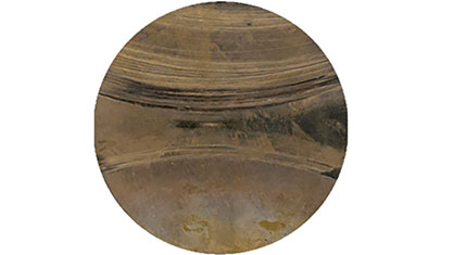 Signs of wear to the pressure disk after 24 hours of operation using the old fixing system with deactivated thrust pad rotation (c) 2020 Oerlikon