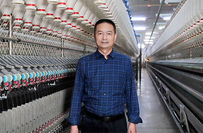 Zhou Weiran, Mill Manager of Jiangyin Huaxi Textile Co. Ltd. © 2023 Rieter Zhou Weiran, Mill Manager of Jiangyin Huaxi Textile Co. Ltd. © 2023 Rieter
