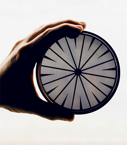 The spinneret with 50,000 ultrafine openings through which the fiber is spun. © 2022 SGL Carbon The spinneret with 50,000 ultrafine openings through which the fiber is spun. © 2022 SGL Carbon