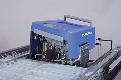 MAGMA warp tying machine for technical yarns © 2022 Stäubli MAGMA warp tying machine for technical yarns © 2022 Stäubli