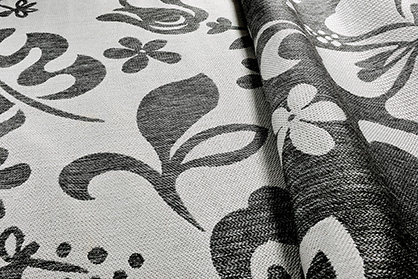 REVERSE binding technology woven on ALPHA 500 Series, perfectly adapted to modern outdoor carpets. (c) 2018 Stäubli REVERSE binding technology woven on ALPHA 500 Series, perfectly adapted to modern outdoor carpets. (c) 2018 Stäubli