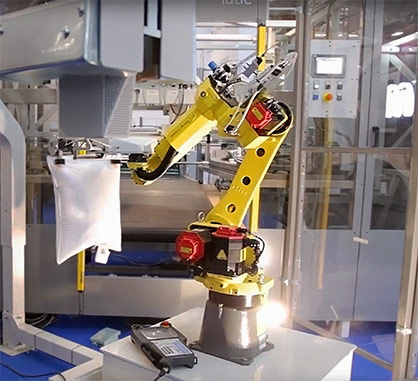 Robotic pillow-making system from ACG Kinna Automatic. © 2022 TMAS Robotic pillow-making system from ACG Kinna Automatic. © 2022 TMAS