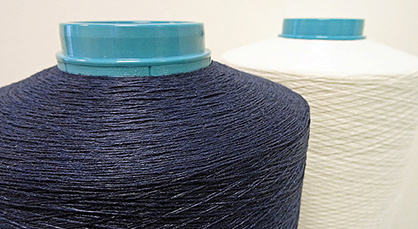 © Photo: Trevira GmbH / Hoftex | Flame retardant, yarn-dyed Trevira filament yarns with a recycled content of 50%